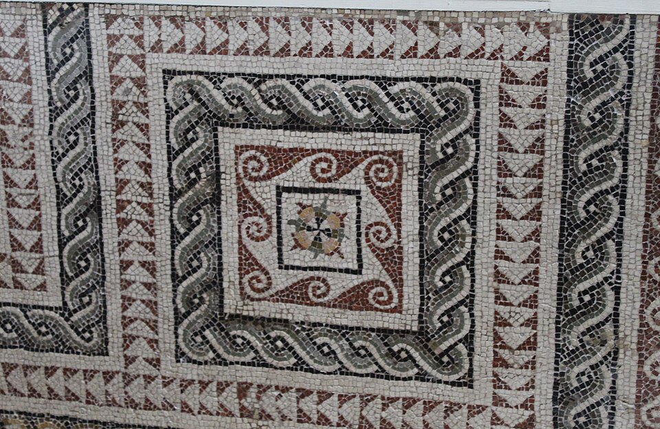 A mosaic built from repeating geometric patterns.