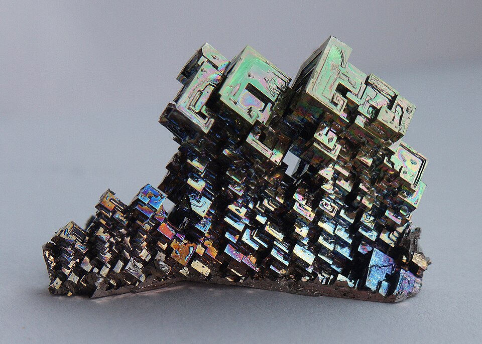 The stepped shapes and colors of bismuth crystals.